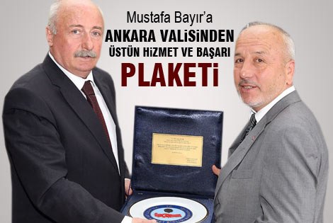 Mustafa Bayırʹa Üstün Hizmet Plaketi