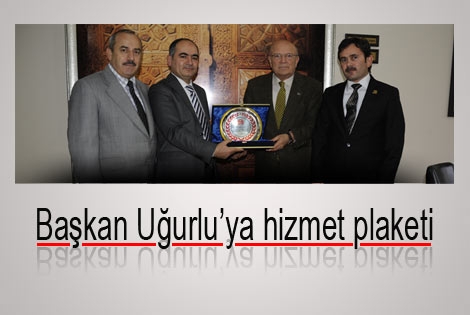 Başkan uğurlu’ya hizmet plaketi