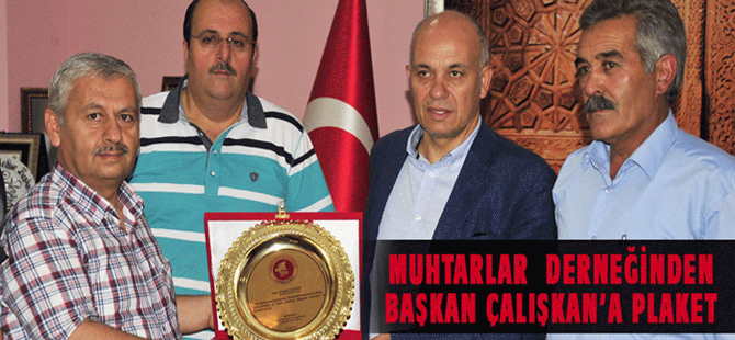 Muhtarlar Derneği’nden Başkan Çalışkan’a Plaket