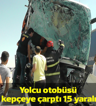 Yolcu Otobüsü Kepçeye Çarptı: 15 Yaralı