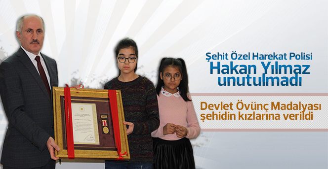 Şehit polis memurunun devlet övünç madalyası kızlarına verildi