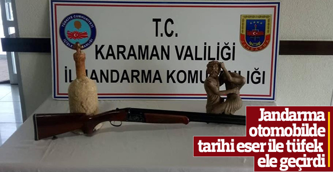 Jandarma, otomobilde tarihi eser ile tüfek ele geçirdi