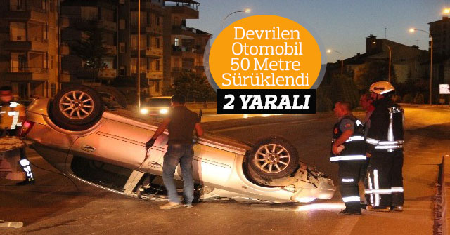 Devrilen otomobil 50 metre sürüklendi: 2 yaralı