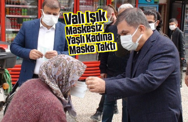 Maskesiz dışarı çıkan kadına Vali kendi elleriyle maske taktı