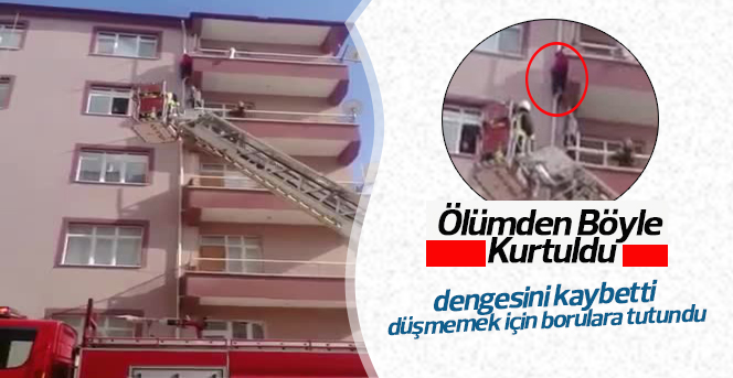 Balkon demirinde asılı kalan kızı ölümden itfaiye kurtardı